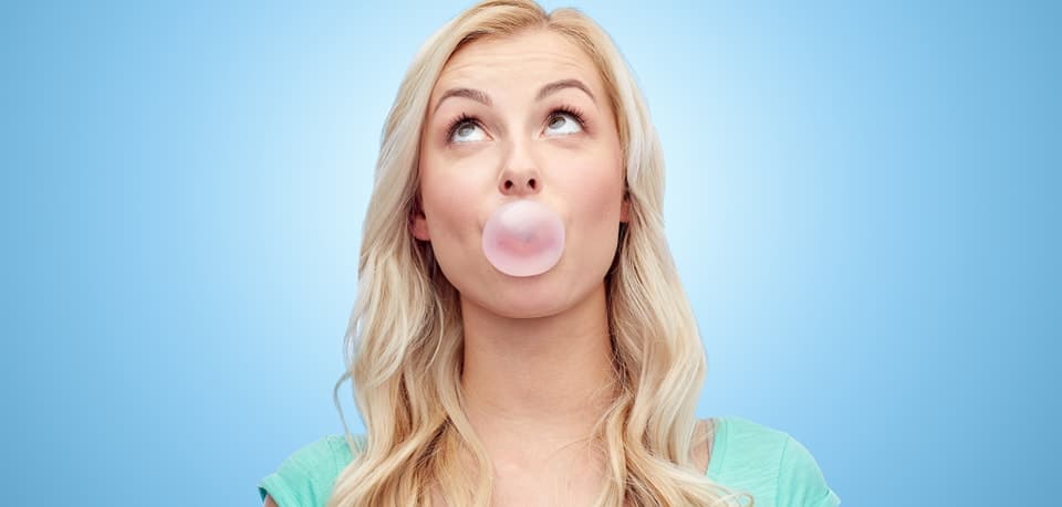 woman chewing bubble gum