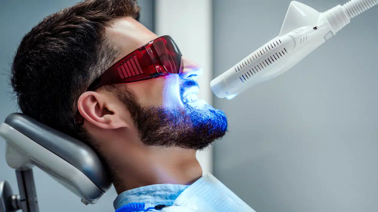 Man in dental office getting teeth whitened