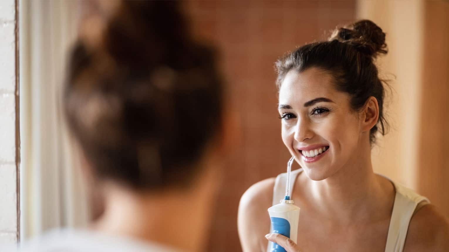 How Water Flossing Can Improve Your Oral Health